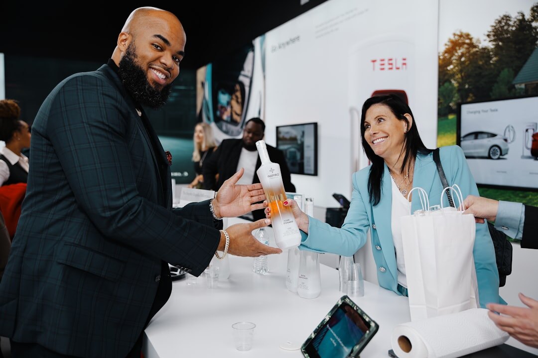 Professionals networking and shaking hands at an event